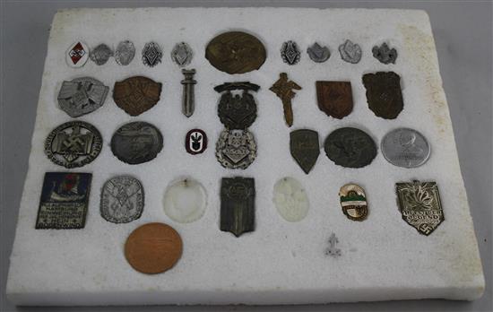 A collection of thirty two Hitler Youth pin badges and other day badges,